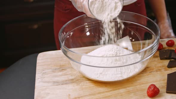 Pour the Flour Into the Transparent Bowl
