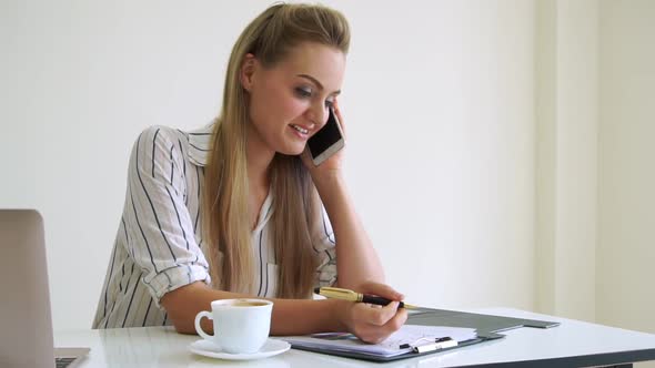 Blonde Business Woman Working at Modern Office