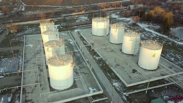 Aerial footage of big fuel reservoires in petrol industrial zone.