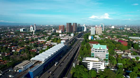 Aerial view of Jakarta Central Business District shot from a drone at sunrise.