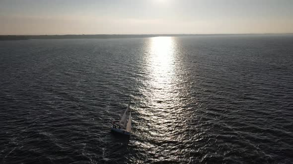 Beautiful Sailing Boat Silhouette on the Kyiv Sea Ukraine