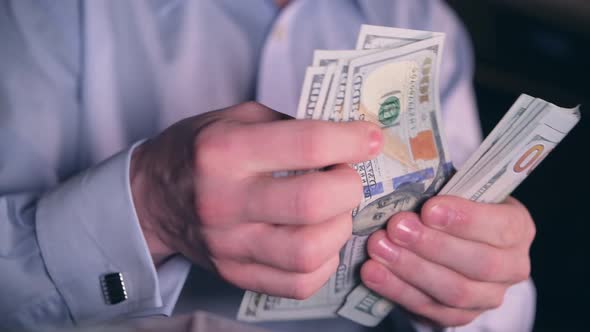 Office Worker Counting Hard earned Money. 