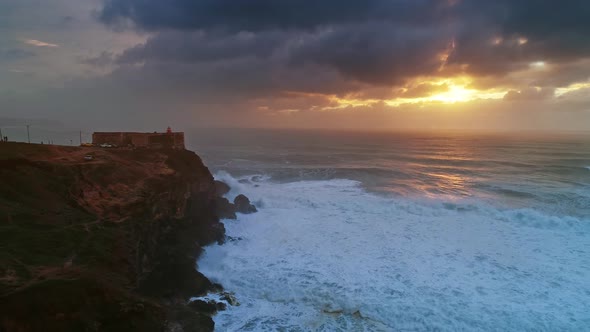 Lighthouse on a Cliff with a Fortress in Nazare