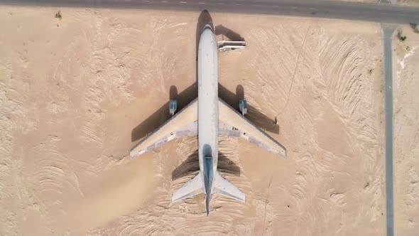 Aerial view above of museum airplane on desert landscape, Abu Dhabi, U.A.E