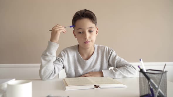 School Boy Having Trouble with His Homework