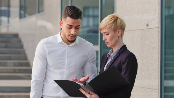 Hispanic Business Man Angry Dissatisfied Boss Leader Stands Outdoors Near Company Building with