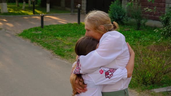 Ukrainian Grandmother and Granddaughter in Vyshyvanka