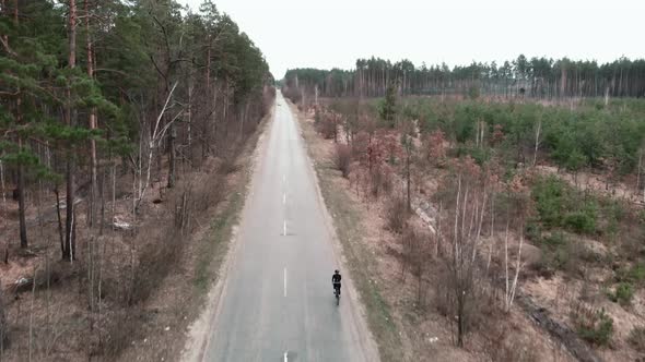 Cyclist on bicycle.