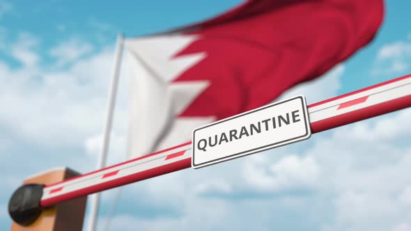 Open Boom Gate with QUARANTINE Sign at the Bahraini Flag