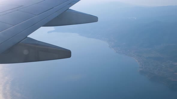 Plane Flies Over the Sea