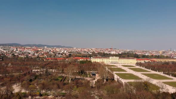 Flight in the afternoon over Schonbrunn Park in Vienna. View of the palace from above. Austria.