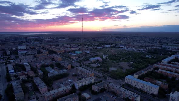 Pink Sunset Over a Small Town