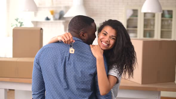 Happy Multiracial Couple Moving in the New House