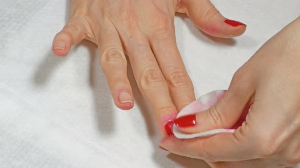 Woman Removes Nail Polish on Her Own