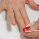 Woman Removes Nail Polish on Her Own - VideoHive Item for Sale