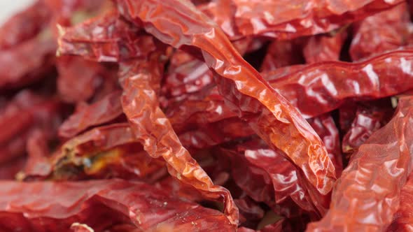 Pile of air-dried chilli peppers 4K slow pan video