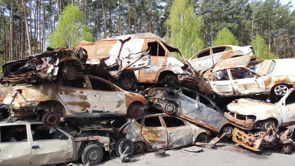 Consequences of the War in Ukraine  a Dump of Shot and Burned Cars in the City of Irpen Near Kyiv