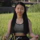Young Asian Woman Was Sitting in Yoga in the Garden She Was Relaxed and Enjoyed the Workout - VideoHive Item for Sale