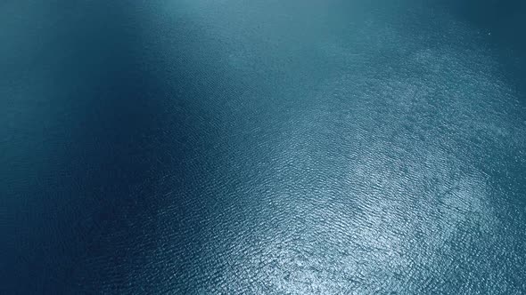 The drone flies over the coast records surroundings, aerial view of Lake Arrowhead, California, USA