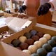 Woman packing handmade soap in cardboard boxes - VideoHive Item for Sale