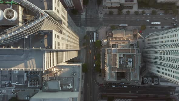 Passing By Huge Office Building Skyscraper Rooftops in Downtown Los Angeles Aerial Birds Eye