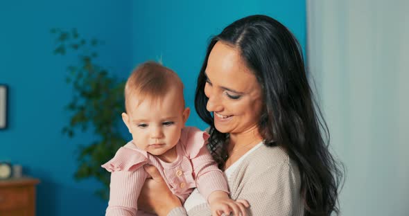 Tired After Work Woman Takes Care of Child Wants to Put Daughter to Bed Wants