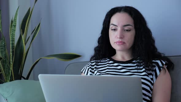 Freelancer Concerned Caucasian Woman Working on a Laptop,tired,closing Rubs Her Eyes From Fatigue