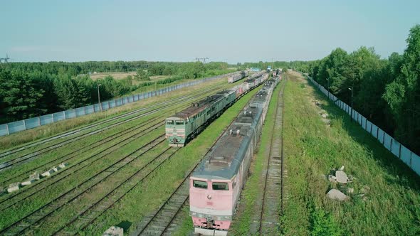 Aerial Shot of an Abandoned Rusty Locomotives and Old Railways