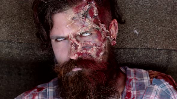 Zombie Head. Bloody Zombie Man with Brains Out. Horror. Halloween.