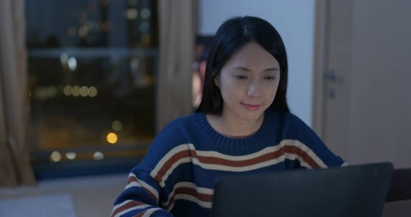 Woman work on computer at home