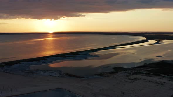 Beautiful sea sunset. Quadcopter flight over the sea at sunset.