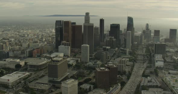 Helicopter aerial over Los Angeles during firework show, night