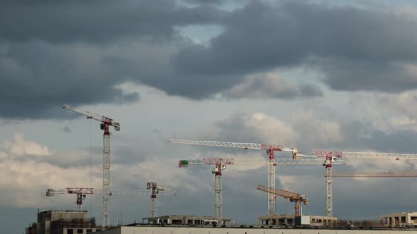construction crane builds a modern building