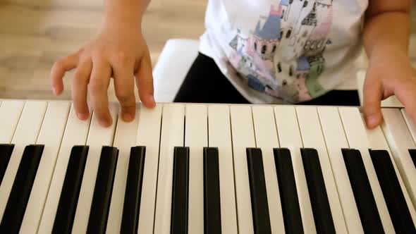 Child Girl Playing the Piano