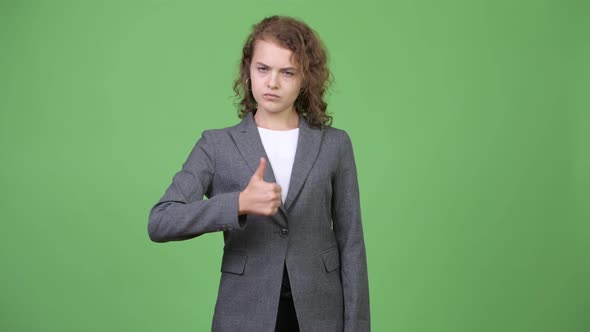 Young Beautiful Businesswoman Giving Thumbs Up