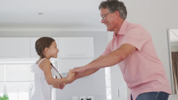 Grandfather and granddaughter spending time together