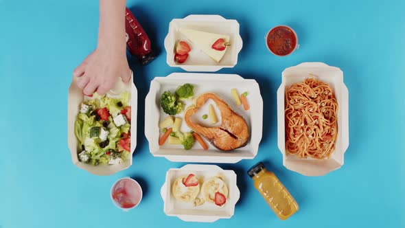 Food Delivery Top View Take Away Meals in Disposable Containers on Blue Background