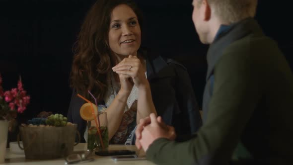 Happy Young Man and Woman Having Interesting Conversation, Talking on Date