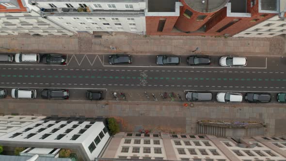 Aerial Birds Eye Overhead Top Down Tracking View of Cyclist Riding in Linienstrasse