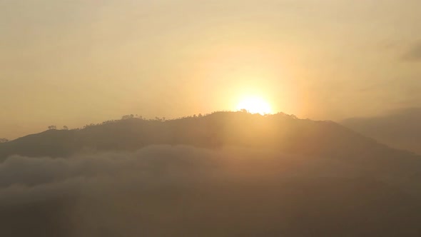 View of foggy sunrise on the Little Adam's Peak in Ella, Sri Lanka