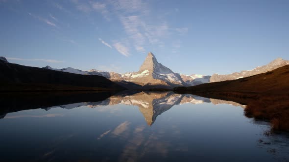 Picturesque View of Matterhorn Peak and Stellisee Lake in Swiss Alps