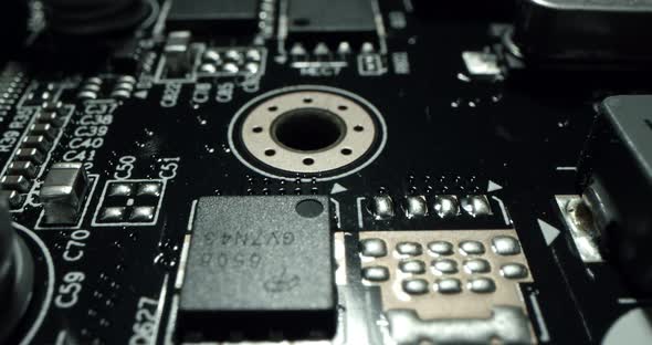 Macro Dolly Shot Side View of a Computer Electrical Circuit with Cip Slots Microchip and