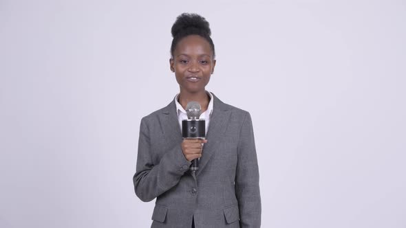 Young African Businesswoman As Newscaster Making Mistake