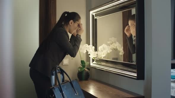 Asian Businesswoman Leaving Hotel Room