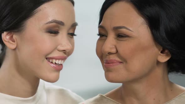 Happy Asian Ladies Hugging and Smiling, Strong Family Relations, Togetherness