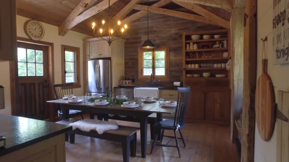 real estate gorgeous kitchen in log cabin winter styled 4k