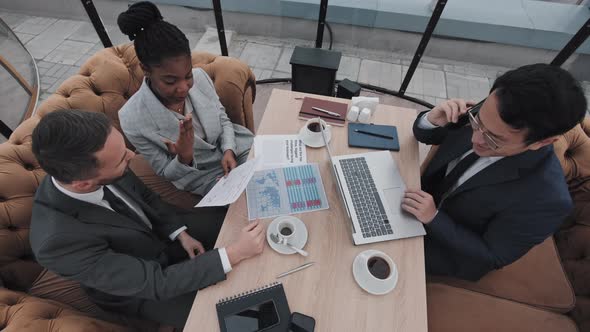 Professional People Working at Table