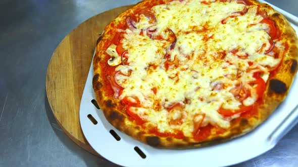 Hot yummy pizza with much cheese