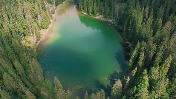 Aerial Top Down Flight Over Amazing Lake of Round Shape