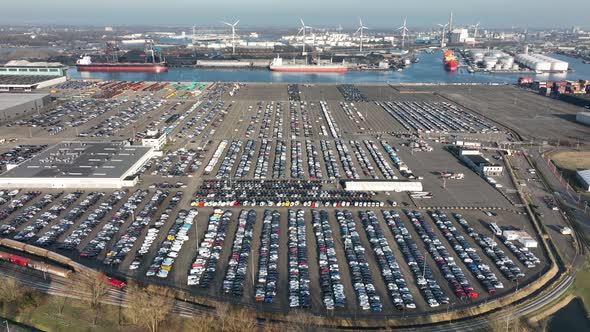 Aerial of a Automotive Car Terminal Parking Lot Storage Loading Area Ready for Distribution in the